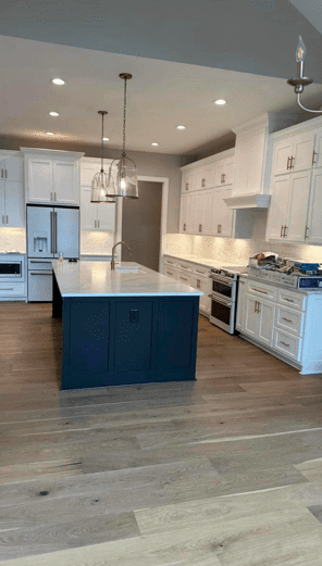 Hartwell Flooring Center | Hartwell, GA | wood laminate flooring in blue and white kitchen